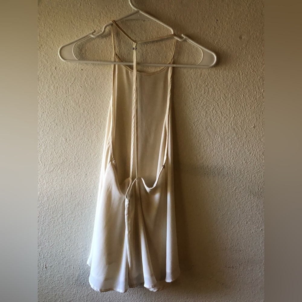 Shows back satin tank